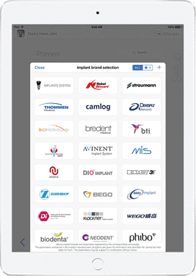 Sistema de selección de implantes dentales en tablet con marcas de equipos y suministros dentales.