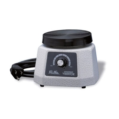 Vibrador de inversión dental para equipos y suministros dentales, ideal para uso profesional en clínicas odontológicas.