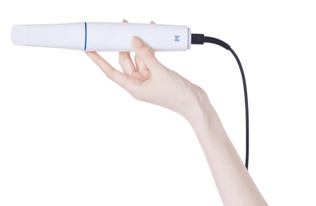 Hand holding dental curing light, dental equipment and supplies, dental restoration tools, for dental clinics.
