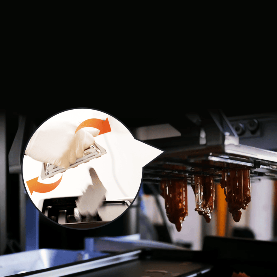 Cargador de piezas dentales para impresora 3D, utilizado en clínicas dentales para facilitar la carga y descarga de modelos y piezas impresas con precisión y eficiencia.