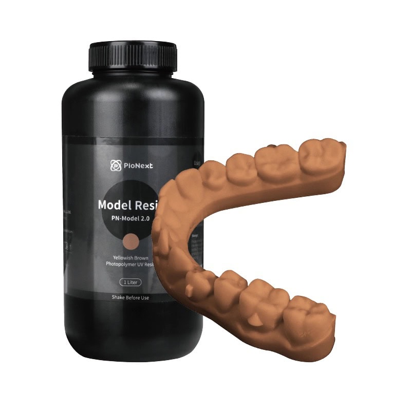 Resina Ortho Model 2.0 PioCreat 1 Resina dental de color marrón y modelo de encías en forma de arco con dientes.
