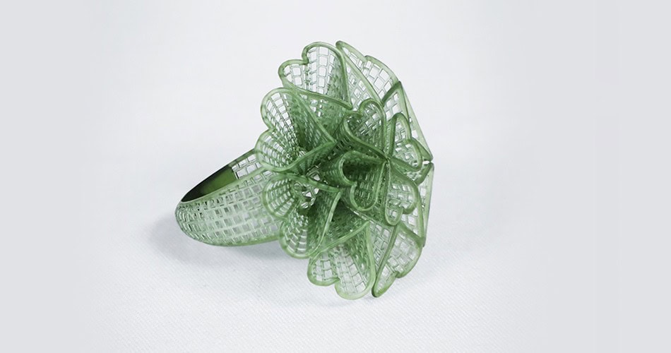 Impresora 3D de resina PioCreat D136 6 Cuchara dental de malla metálica en color verde, utilizada en procedimientos odontológicos para la toma de impresiones y manejo de materiales dentales.