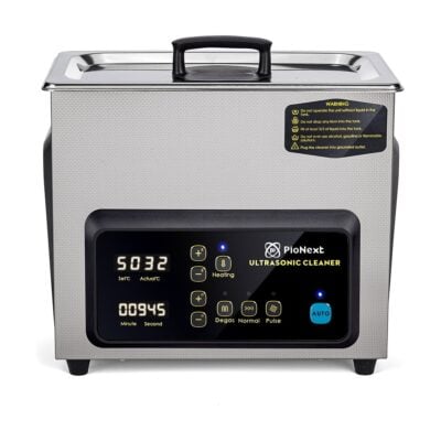 Equipo de limpieza ultrasónica dental PioNex para clínicas dentales, con pantalla digital y control de temperatura y tiempo.
