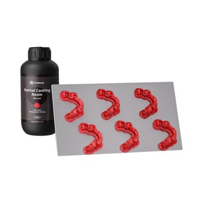 Resina para fundición dental y moldes en silicona con moldes de cera en color rojo para prótesis dentales.